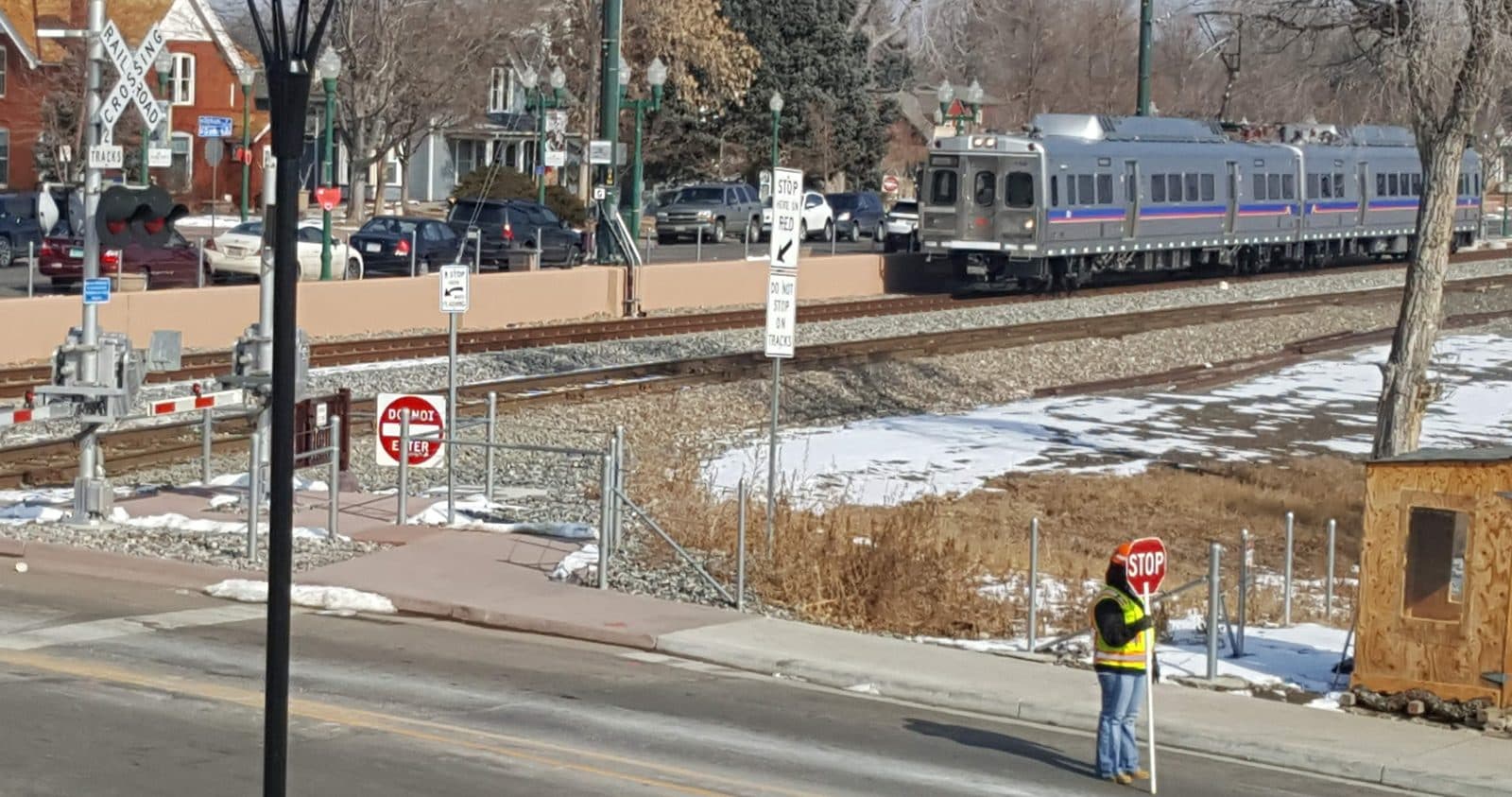 A G Line commuter train passing through Olde Town Arvada at the Vance Street crossing